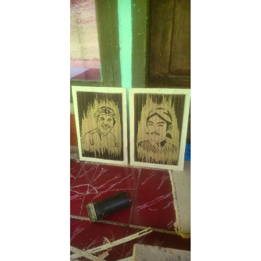 ukiran bambu hitam motif wajah
