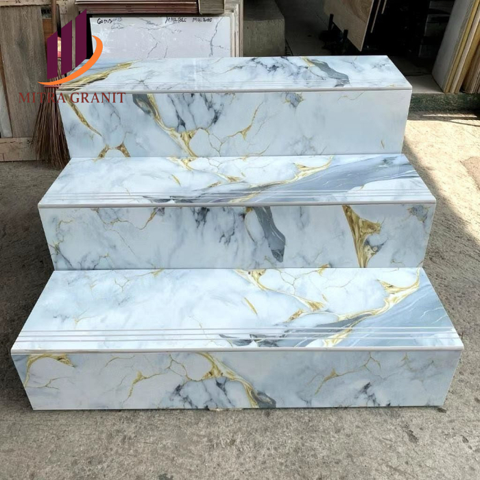 GRANIT TANGGA MOTIF MARMER UKURAN 30x100 STEPNOSING BAVEL