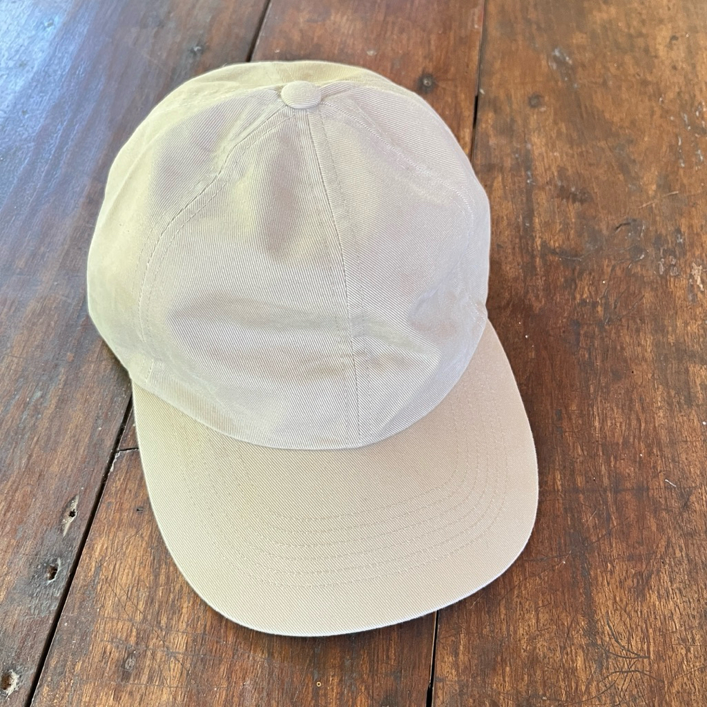 topi uniqlo strap kulit warna coklat muda