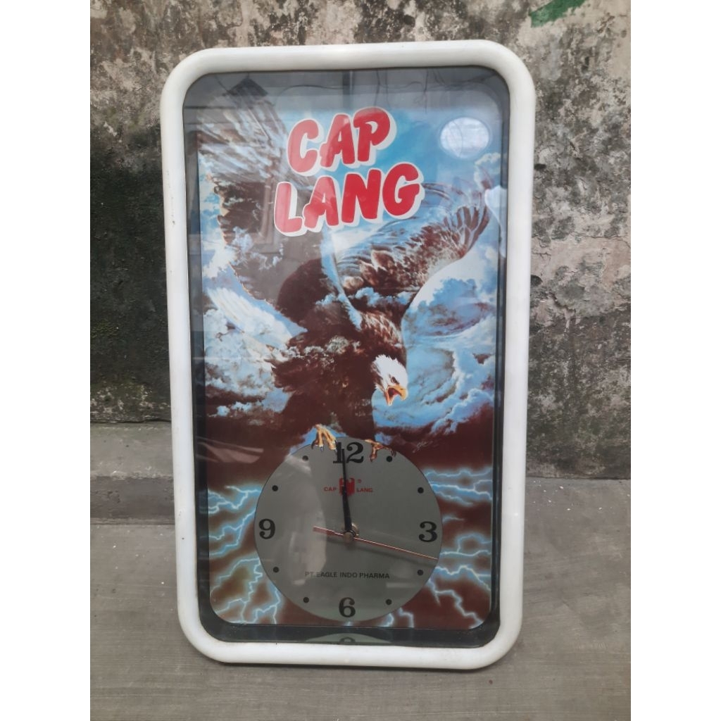 jam dinding promosi dari cap lang