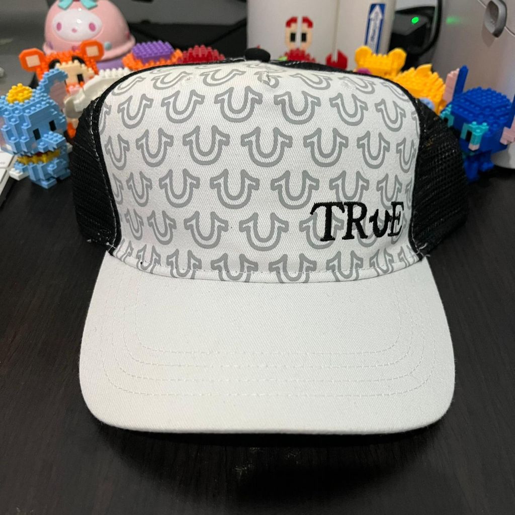 Topi True Religion Band