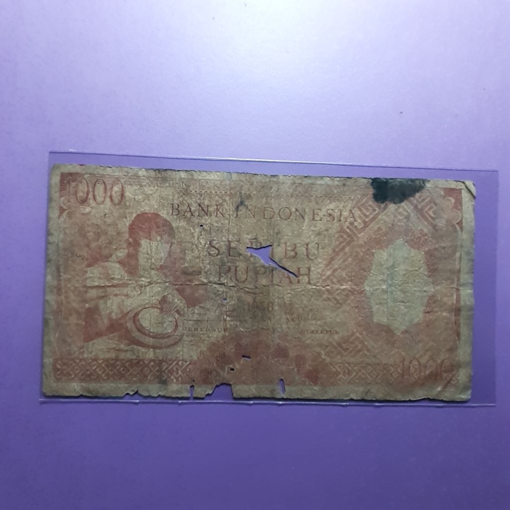 Uang kuno 1000 rupiah pekerja coklat