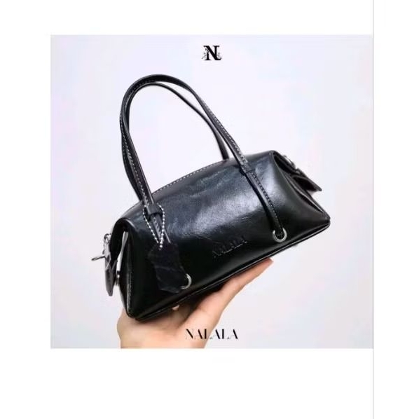 tas nalala hitam