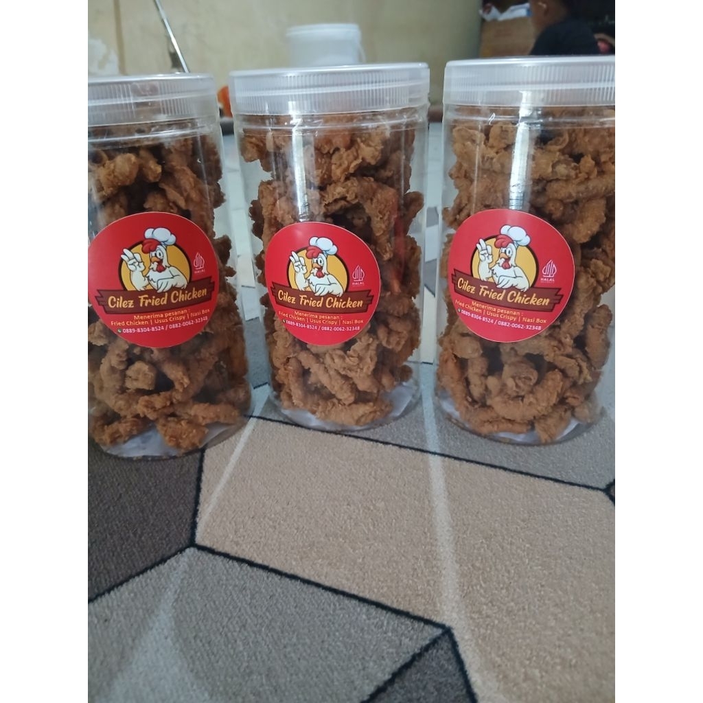 usus krispi kemasan toples