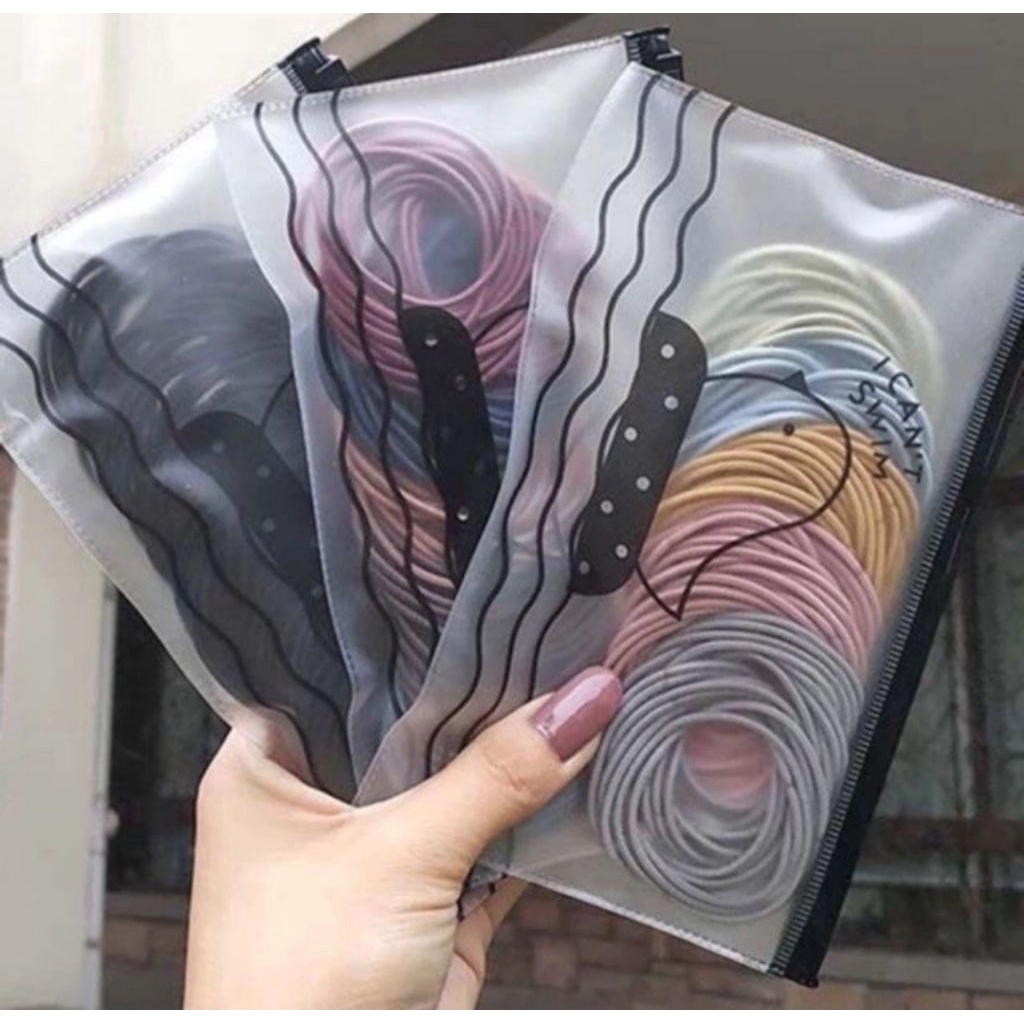 Ikat rambut polos 100pcs free pouch