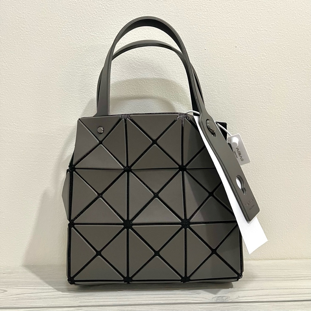 tas kecil lucu warna abu-abu bahan karet bisa muat dompet kecil,hp, makeup. cocok untuk dipakai jala