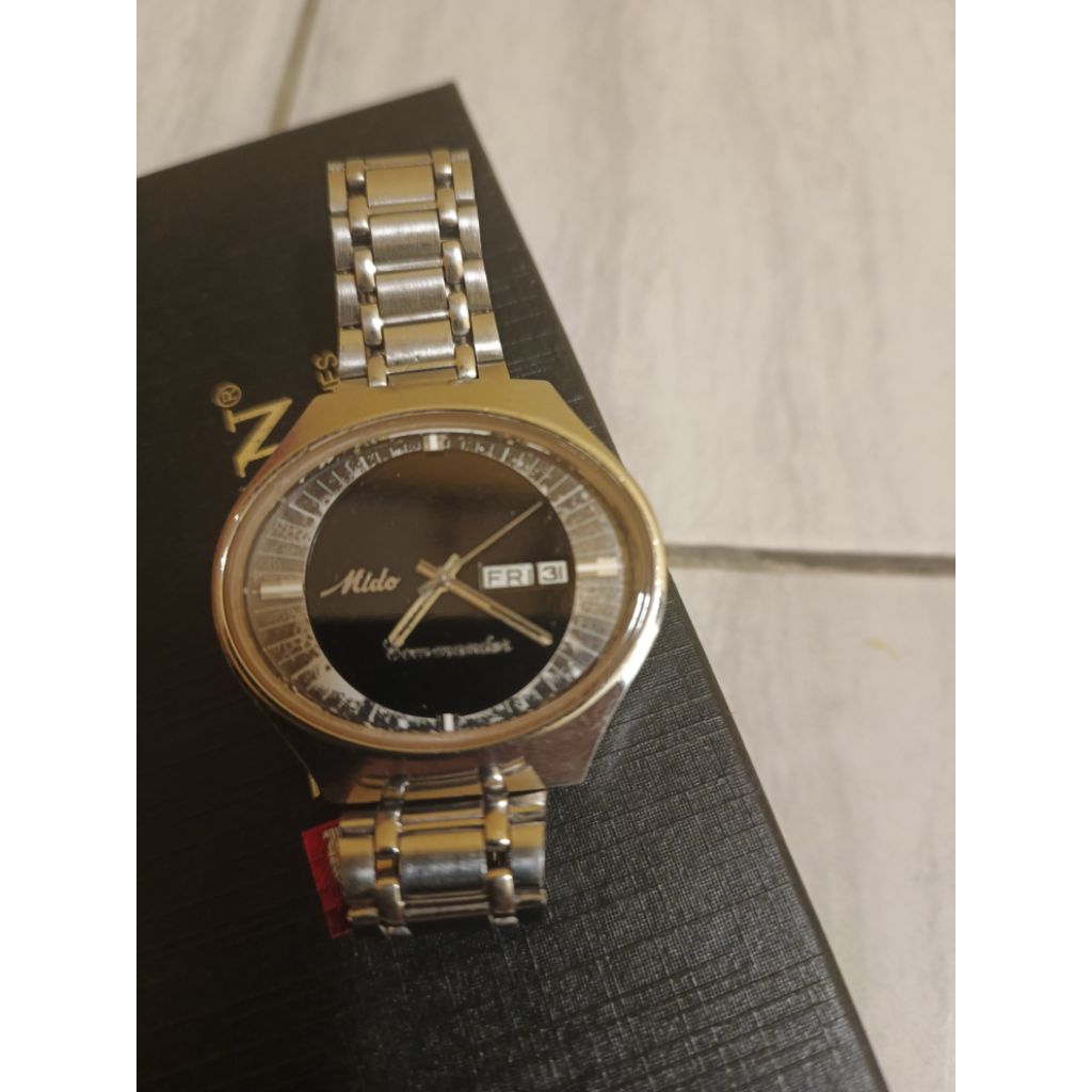 jam vintage mido Commander