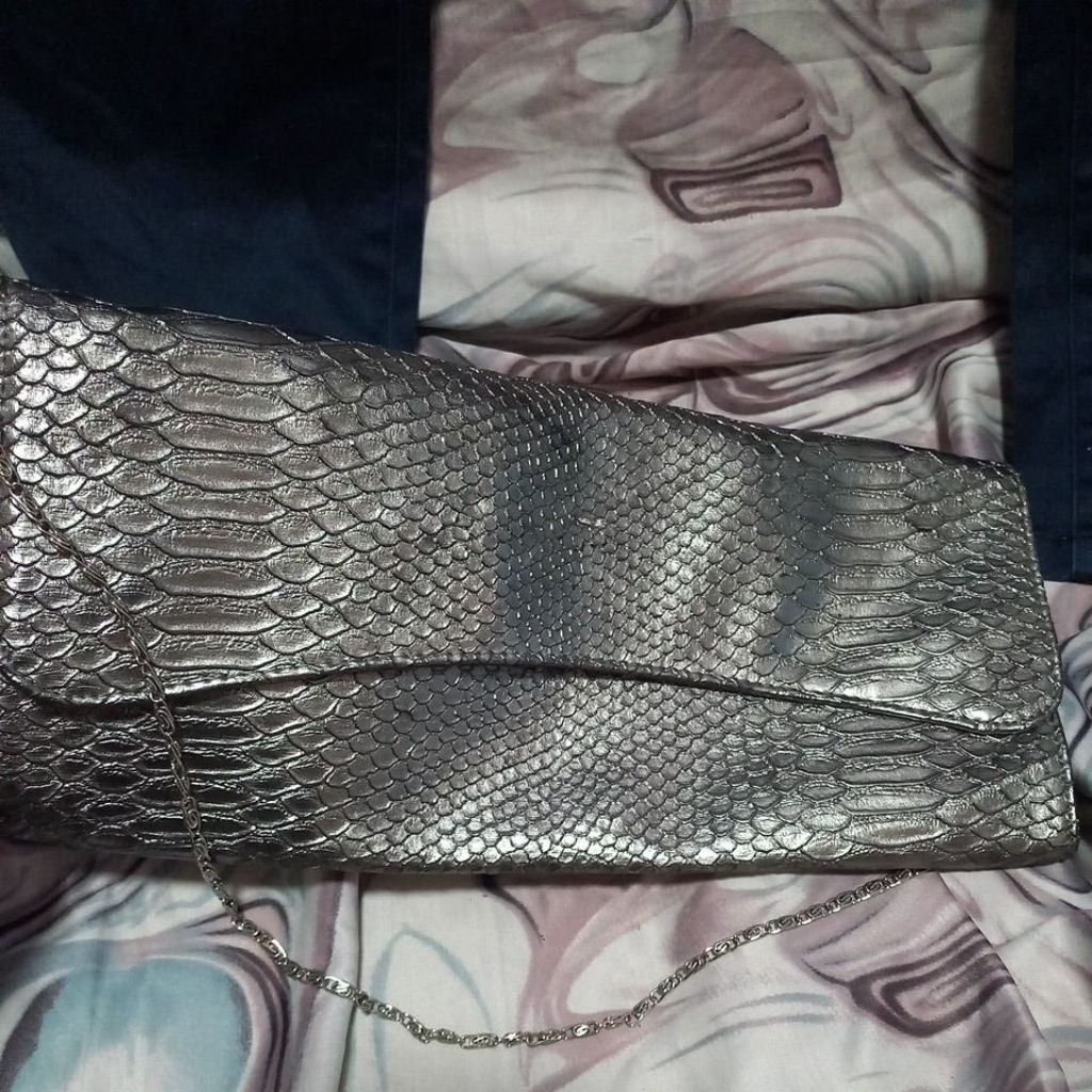 tas pesta kulit ular