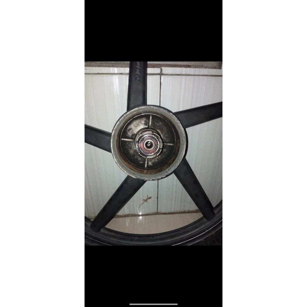 Pelg Velg bintang Zigen depan grand