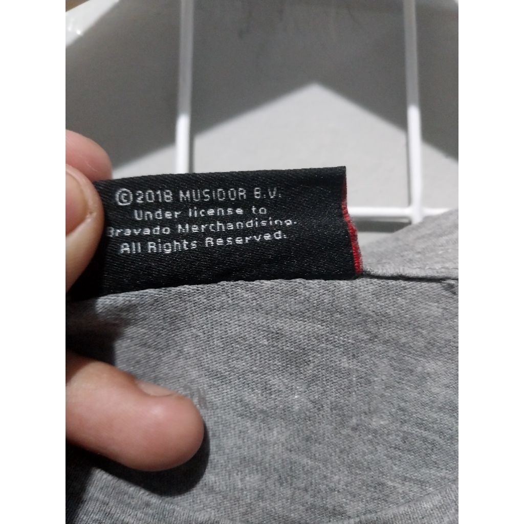 kaos band rolling stones official tag
