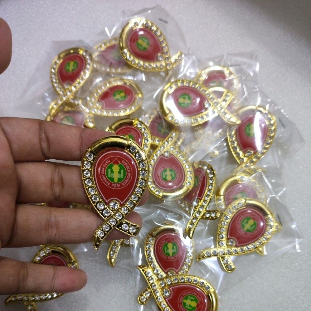 Pin Bros Gold Logo PGRI