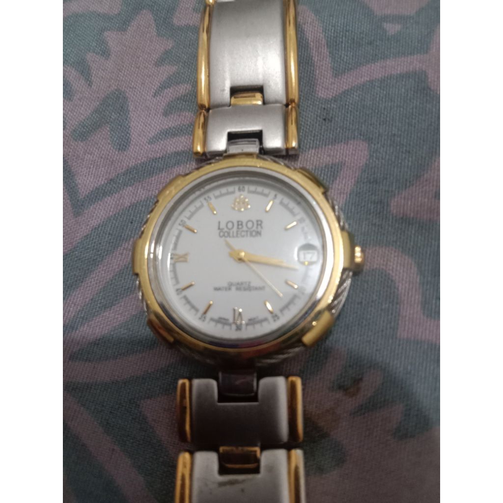 Jam tangan wanita merk lobor 23K gold plated quartz seri LO-9030-M silver kondisi hidup normal, peng