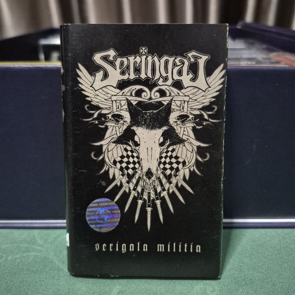 kaset pita seringai - serigala militia