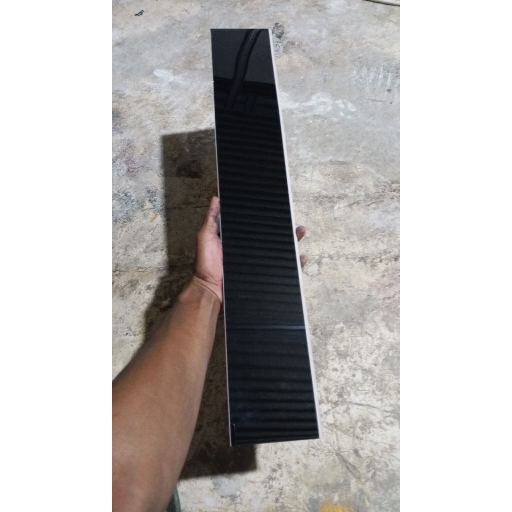 List Granit 10x60 Hitam Polos