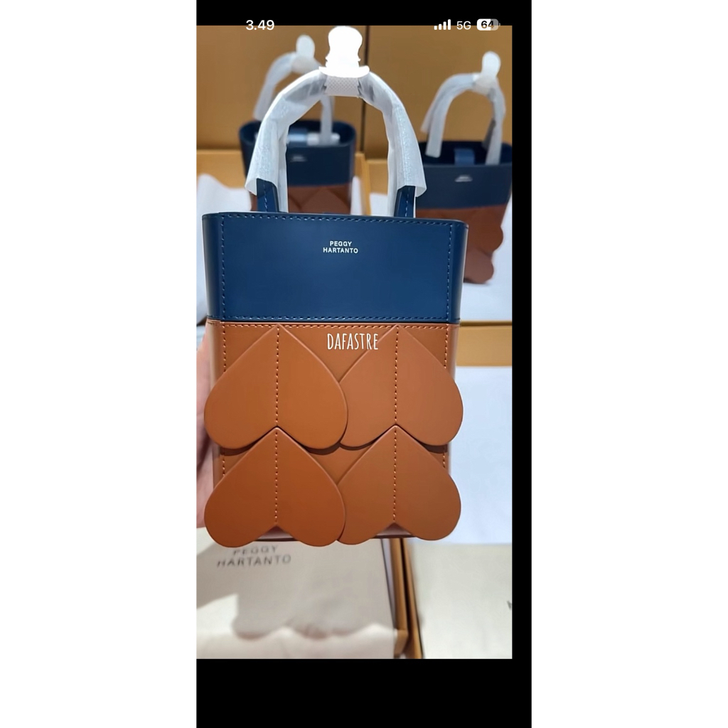 Peggy Hartanto Axil Marine Tan