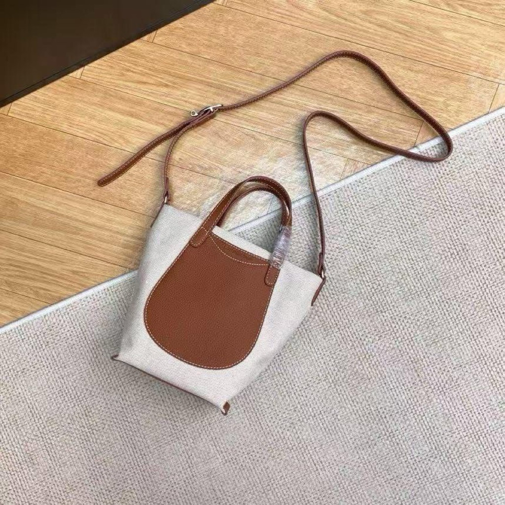 COMPLICE SLING BAG
