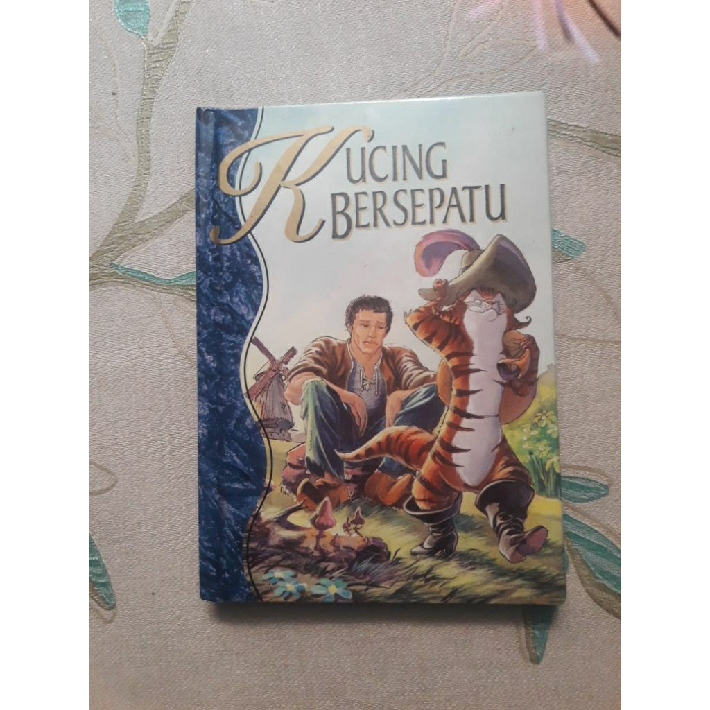 Kucing Bersepatu
