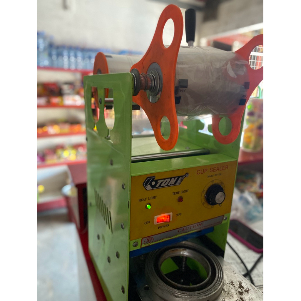 CUP SEALER MERK TON