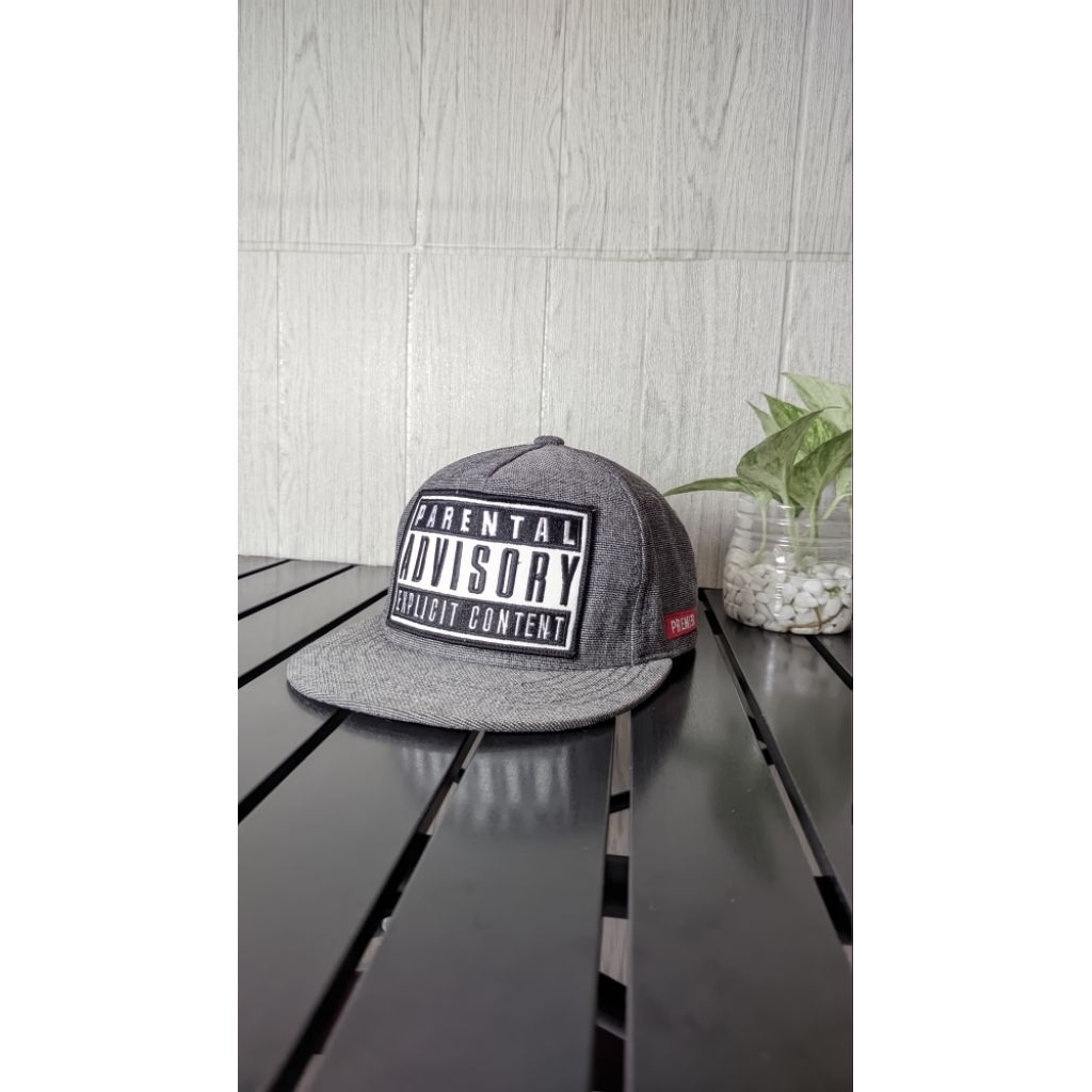TOPI PREMIER Parental Advisory