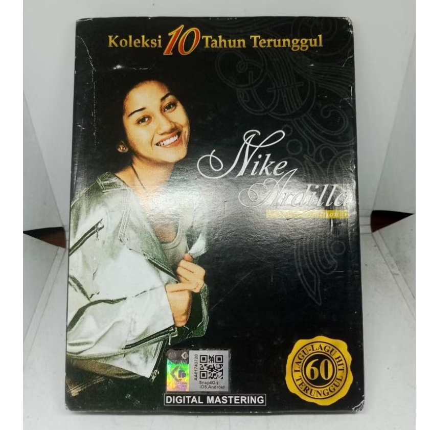 CD_Import_Nike_Ardilla_4CD_-_Koleksi_10_Tahun_Terunggul_/_Made_In_Malaysia