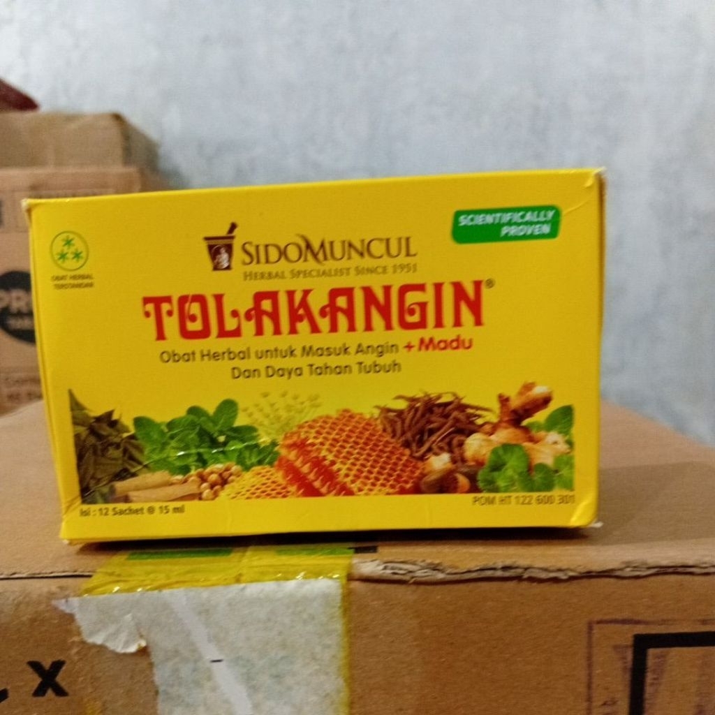 tolak angin cair isi 12