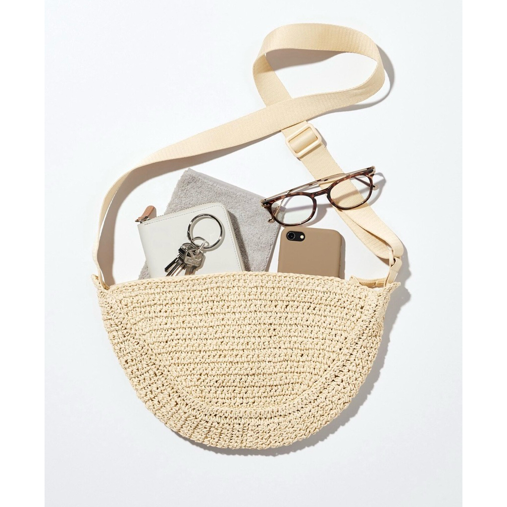 Preloved Uniqlo Half Moon Sling Bag Crochet Limited Edition