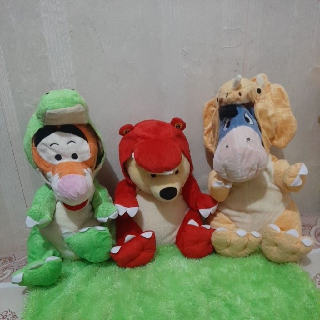 boneka pooh kostum dinosaurus