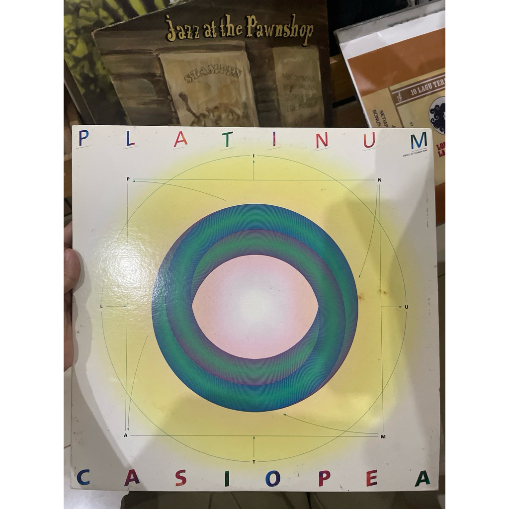vinyl Platinum Casiopea piringan hitam
