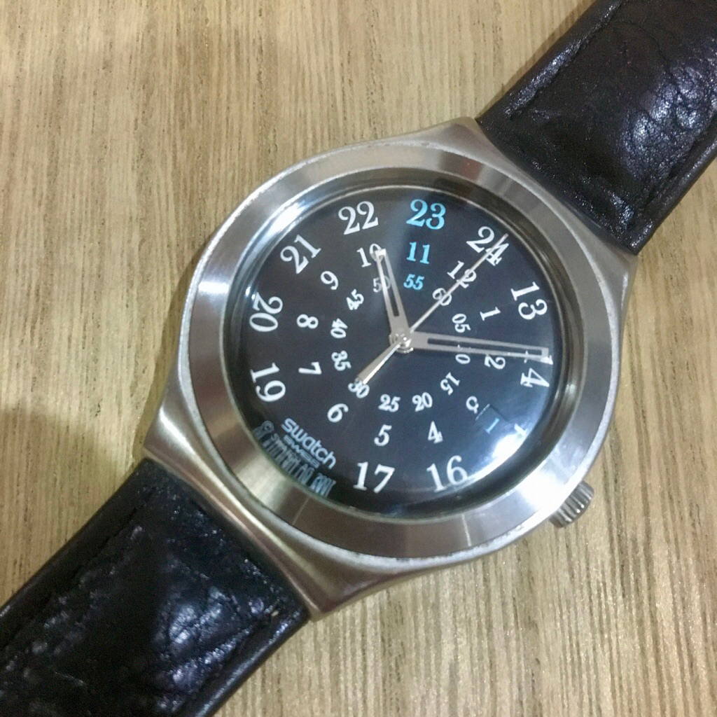 Swatch Irony Stainless “POUSSIERE D'ENCRE” YGS454