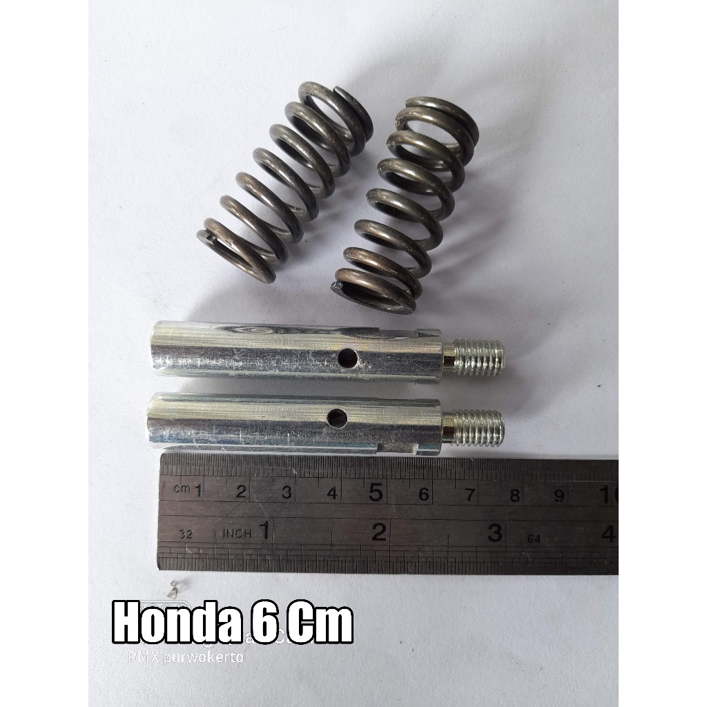 Peninggi suling Shock Honda Win