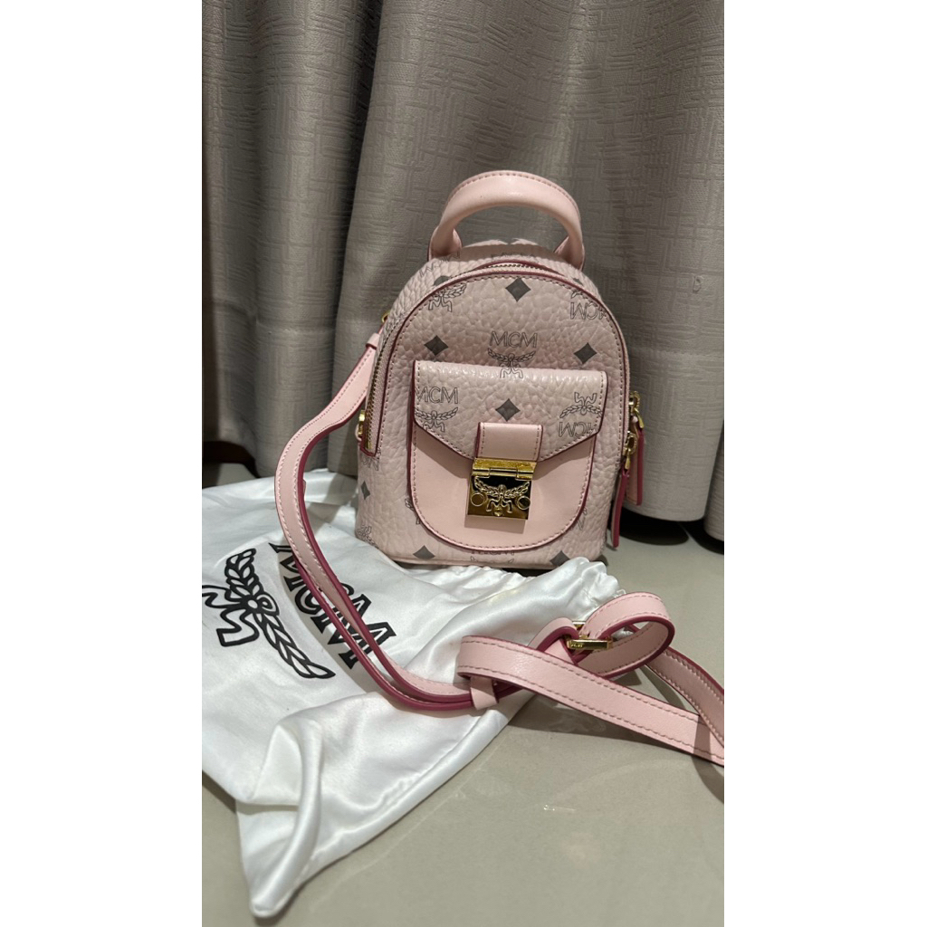 MCM Stark mini Visetos backpack in a powder pink color