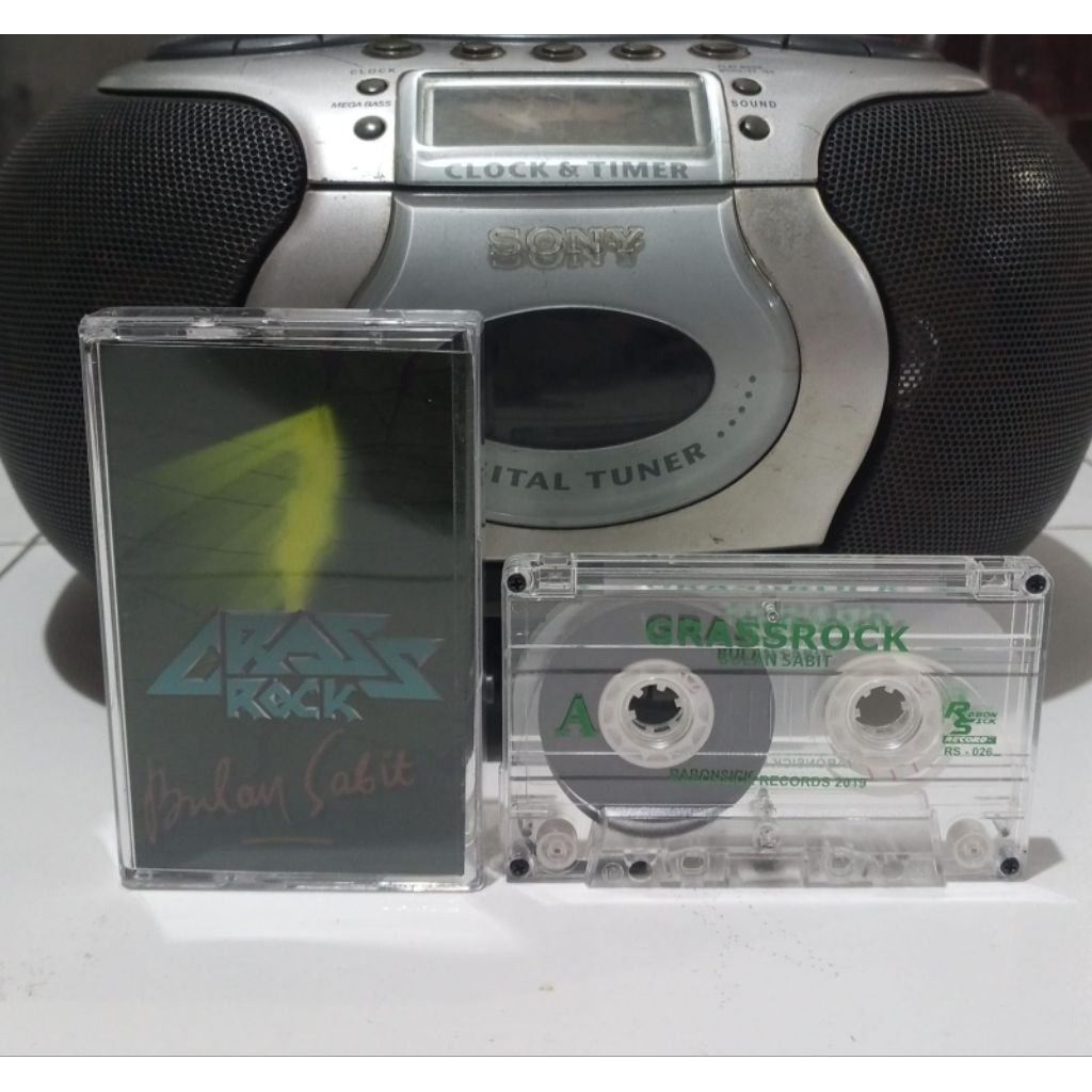 Kaset Pita Grass Rock - Open Segel