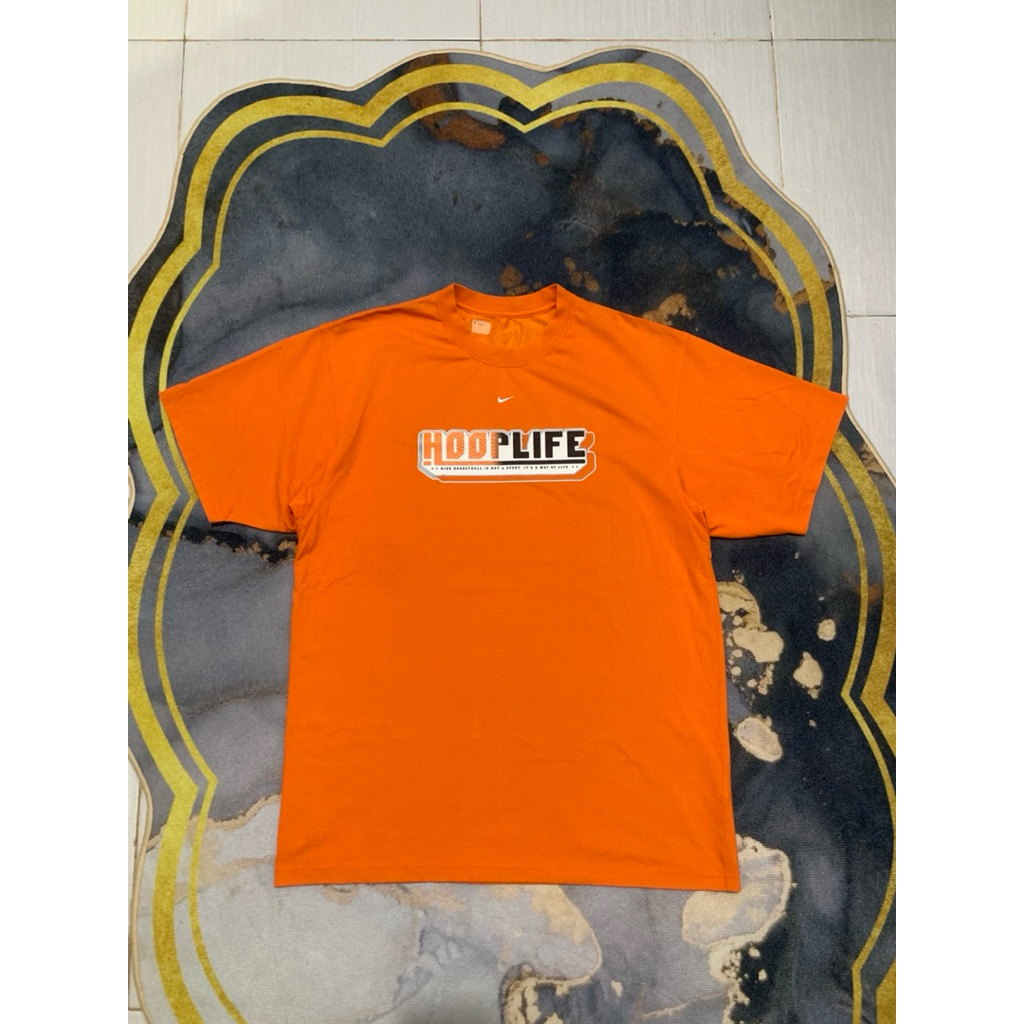 kaos nike center second