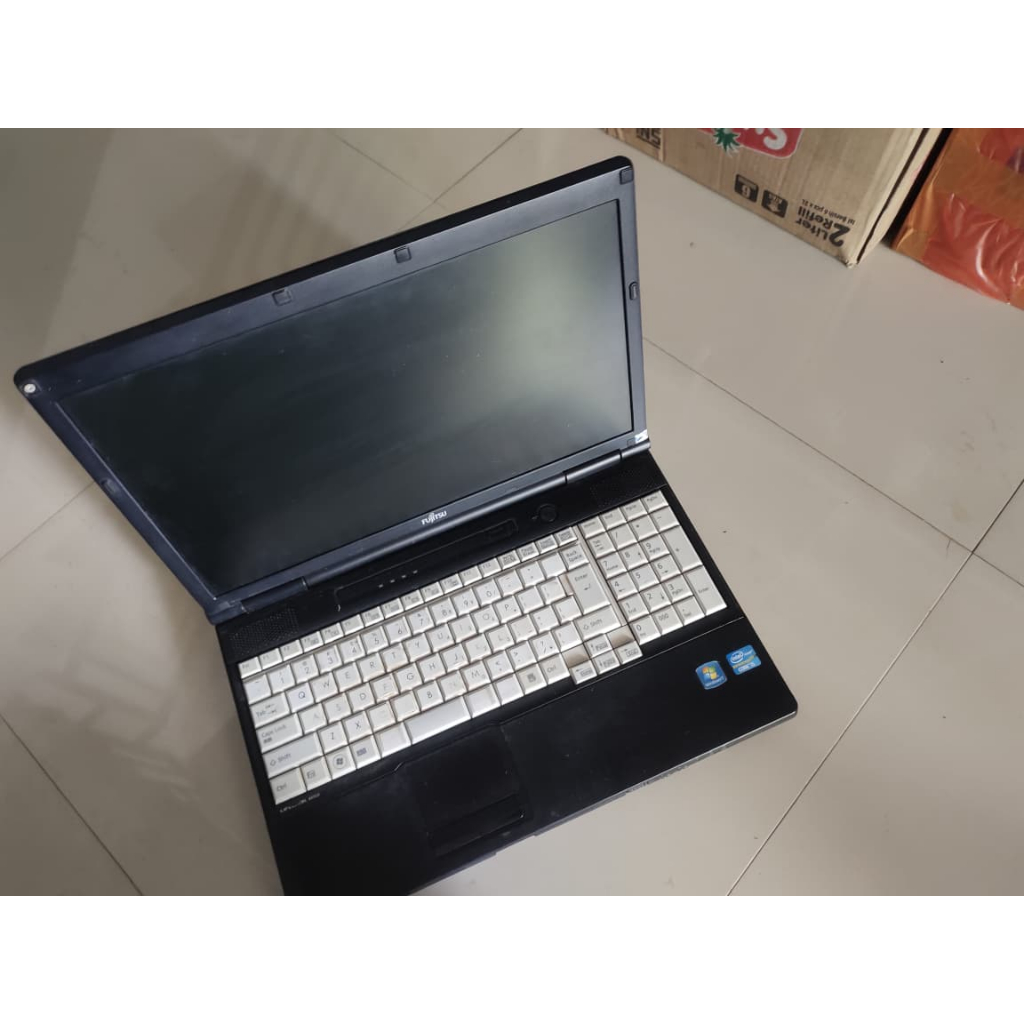 Laptop Fujitsu ADP-65JH ABZ Bekas – Cocok untuk Kerja Ringan & Office