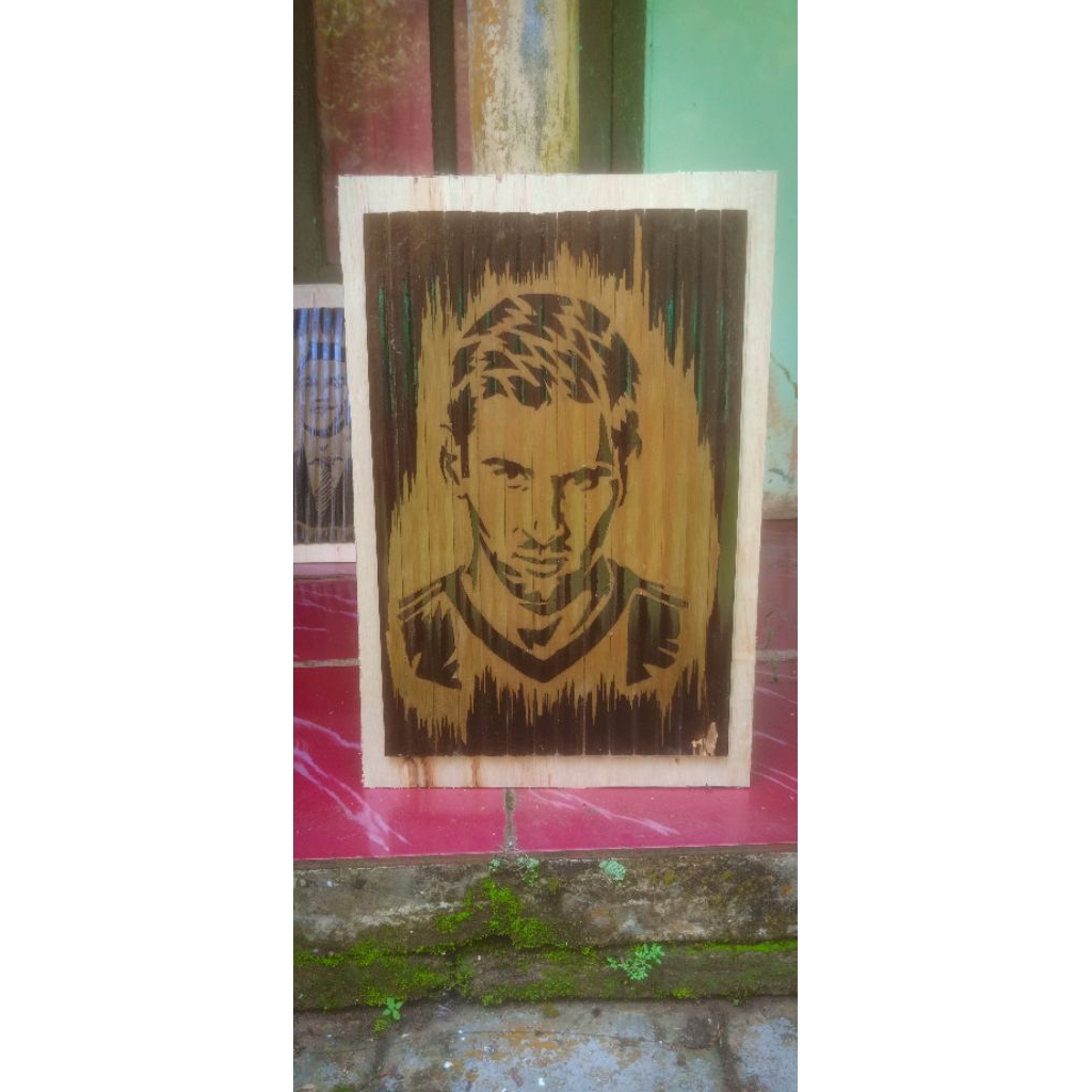 ukiran bambu hitam motif wajah