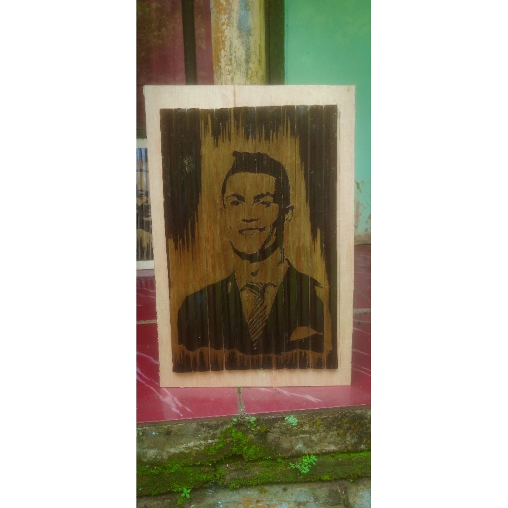 ukiran bambu hitam motif wajah