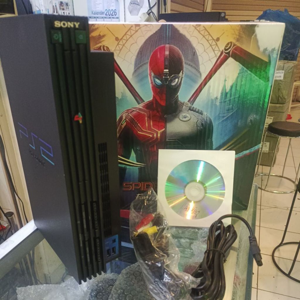 PS2 Sudah matrix 5.0 ( bisa baca kaset) Mesin + kabel2 nya saja.
