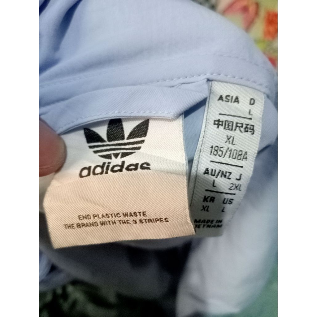 Jaket adidas paeasut windbreakers adicolour
