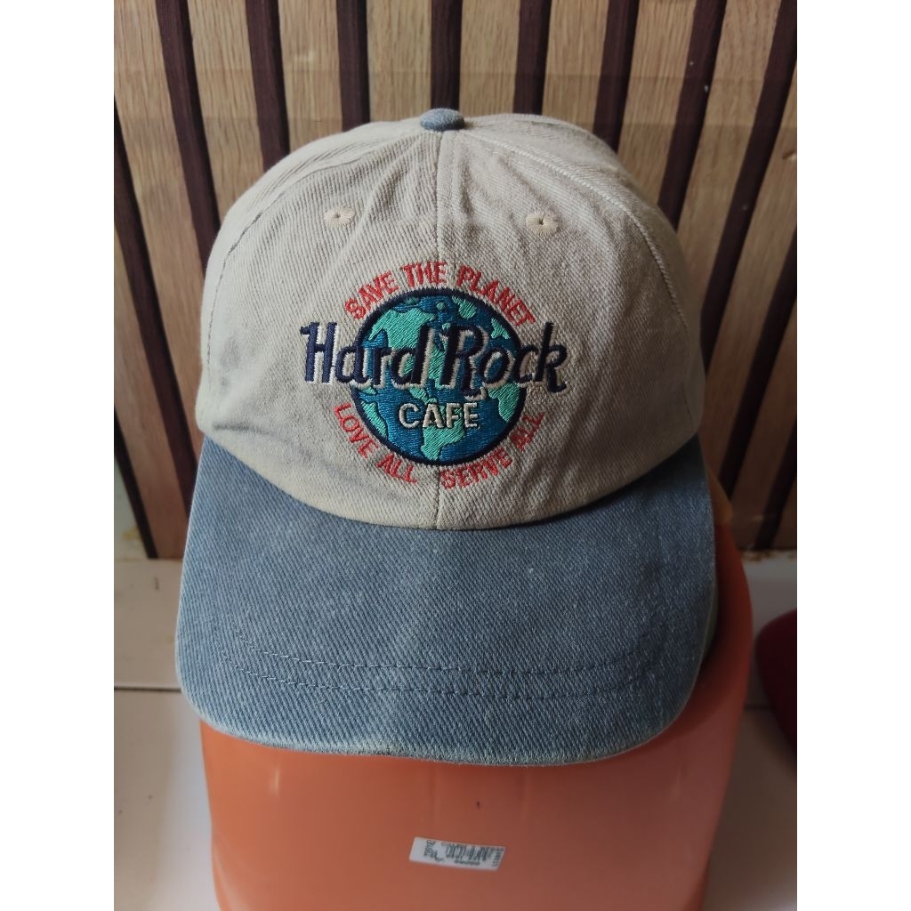 topi second planet holllywood dan hard rock cafe