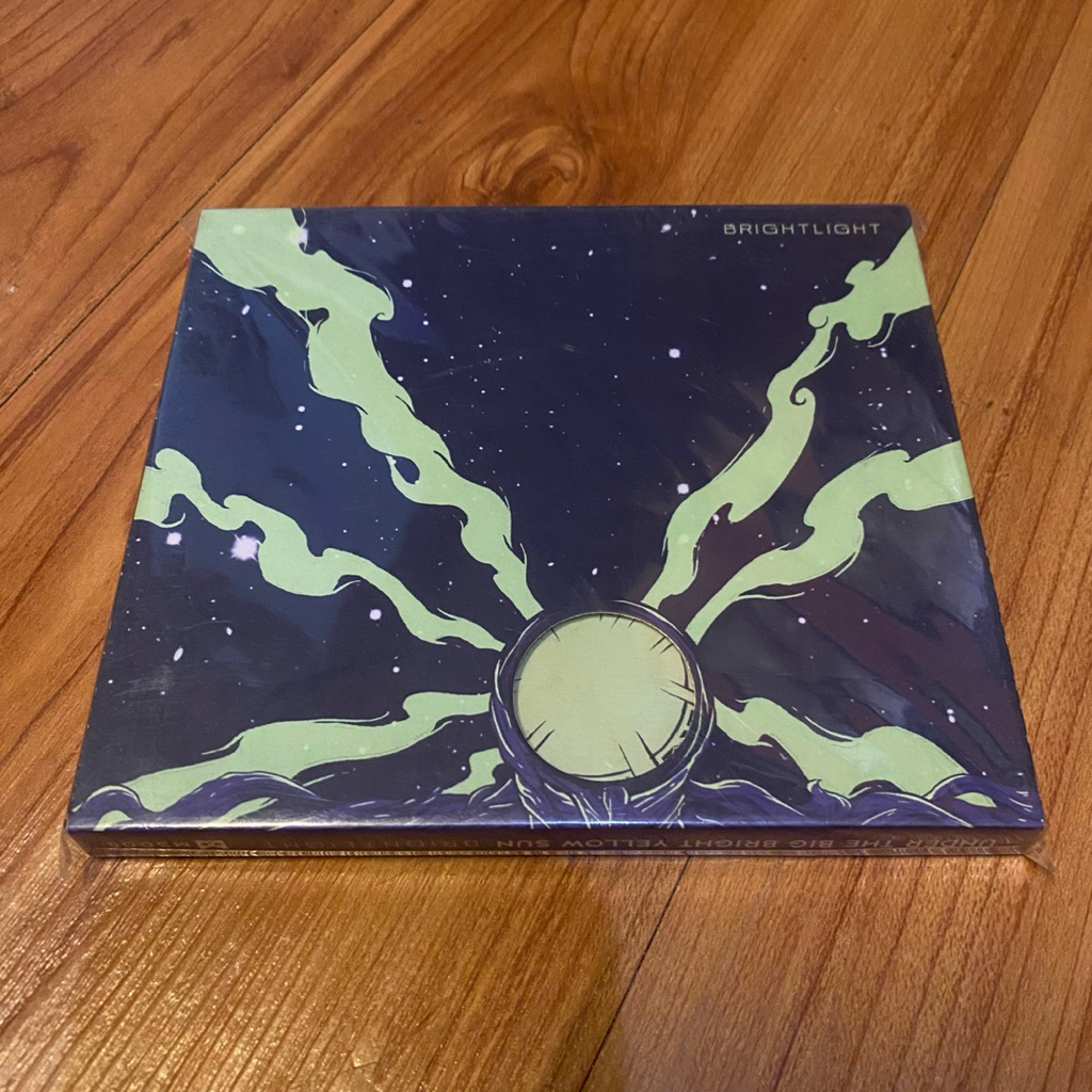 CD under the big bright yellow sun - bright light