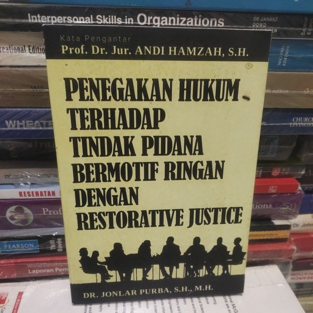 penegakan hukum terhadap tindak pidana bermotif ringan dengan restorative justice