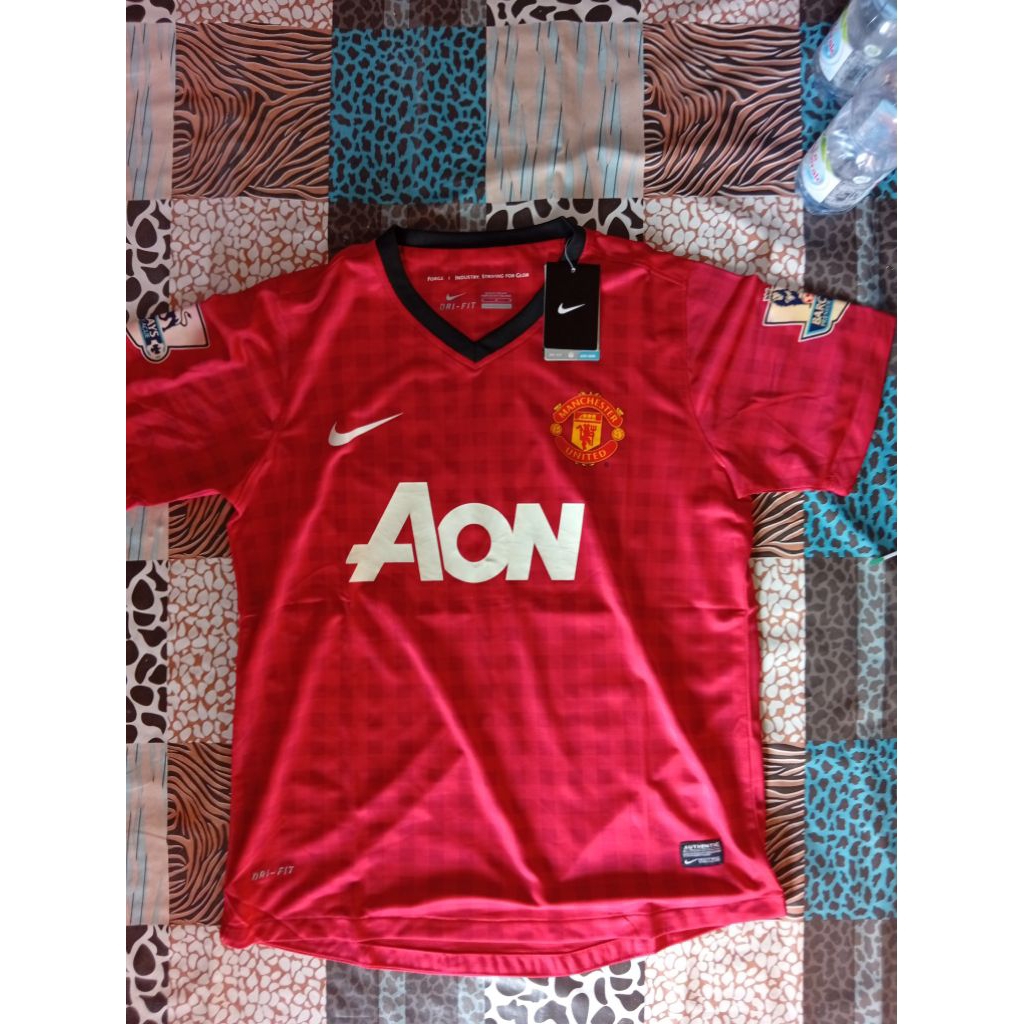 sepaket jersey MU home 2011 dan 2013