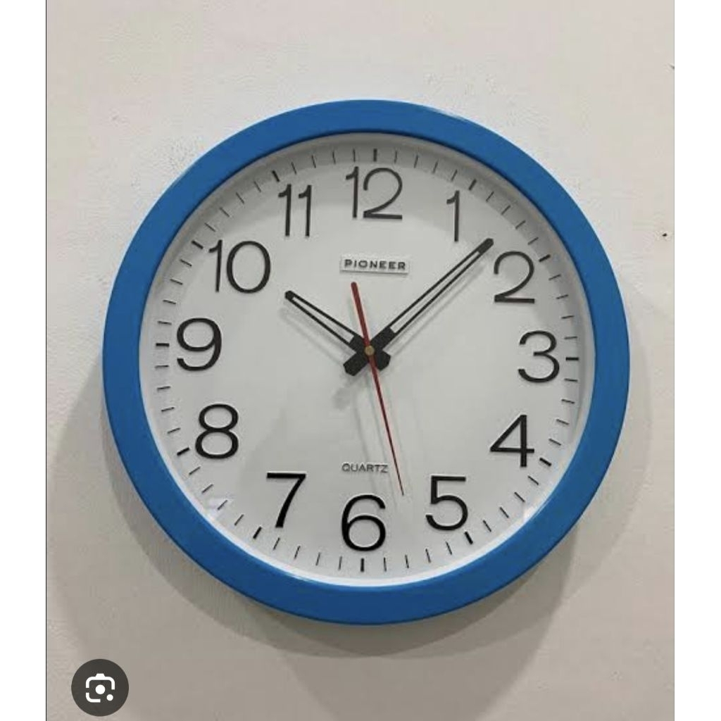 jam dinding ruang tamu