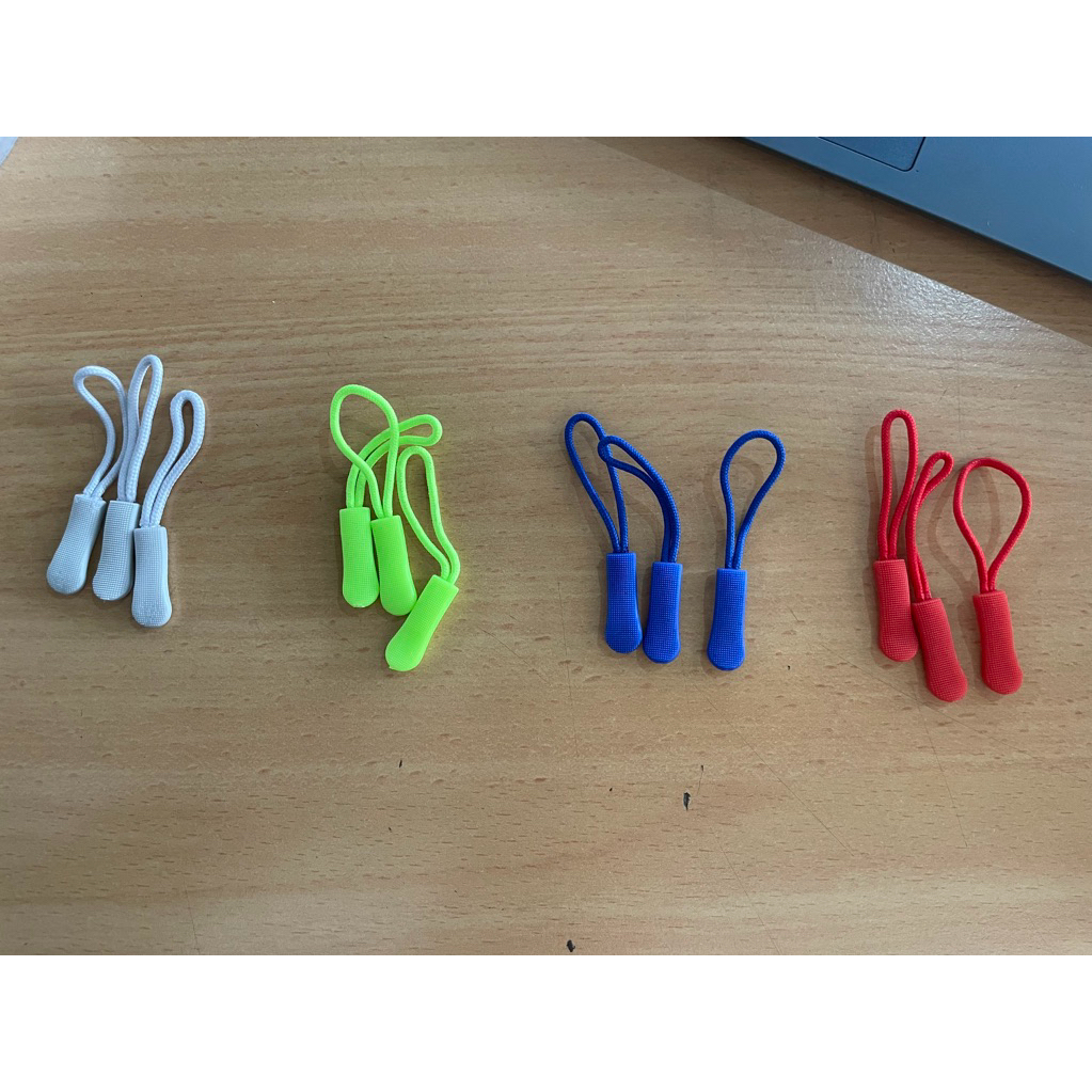 ZIPPER PULLER (Tarikan resleting)