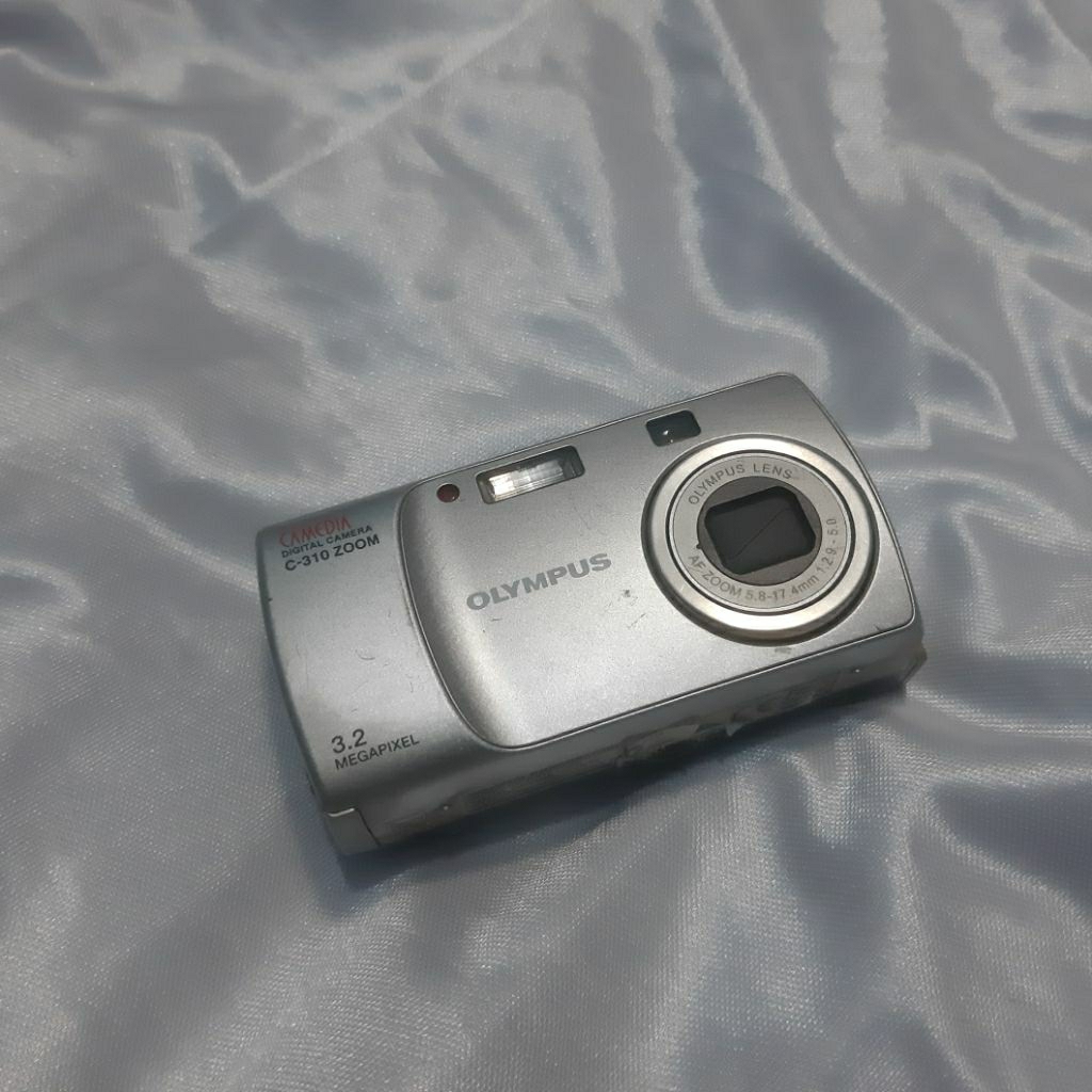 Olympus Camedia C310 Zoom Bahan