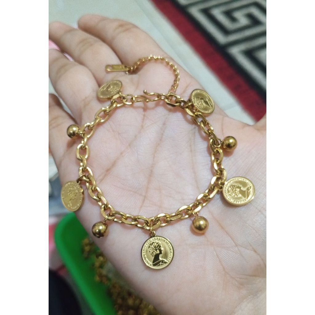 gelang titanium mainan motif koin