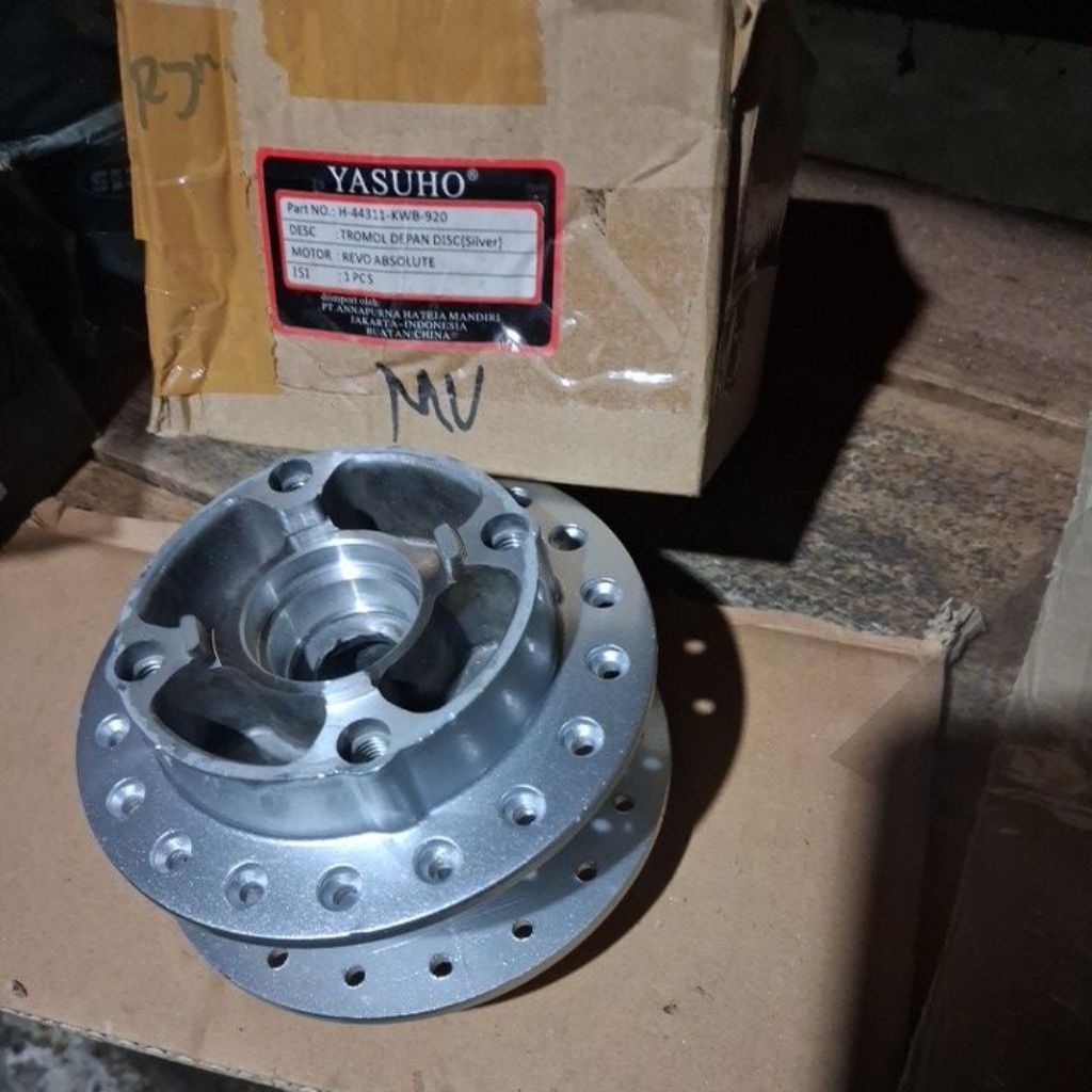 tromol depan revo absolute