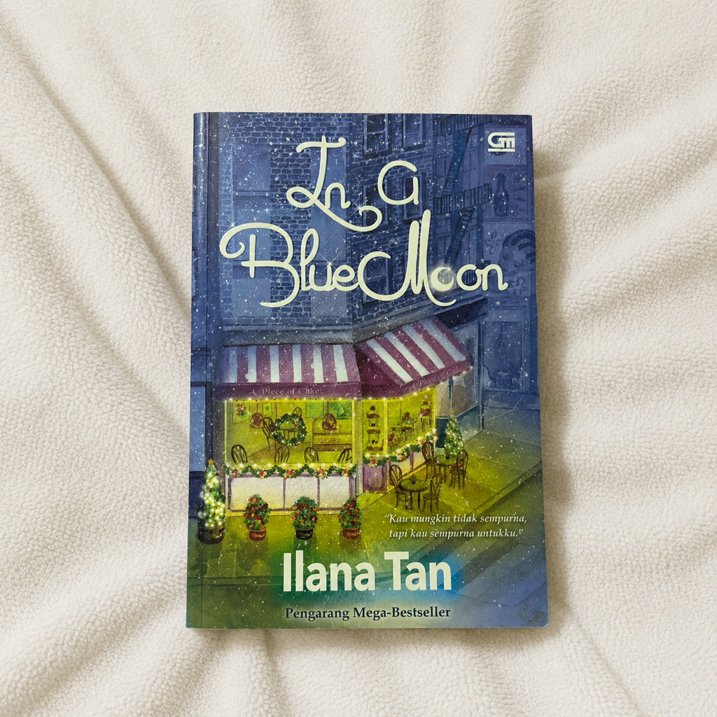 Preloved Buku Novel “In a Blue Moon” oleh Ilana Tan (Soft Cover)