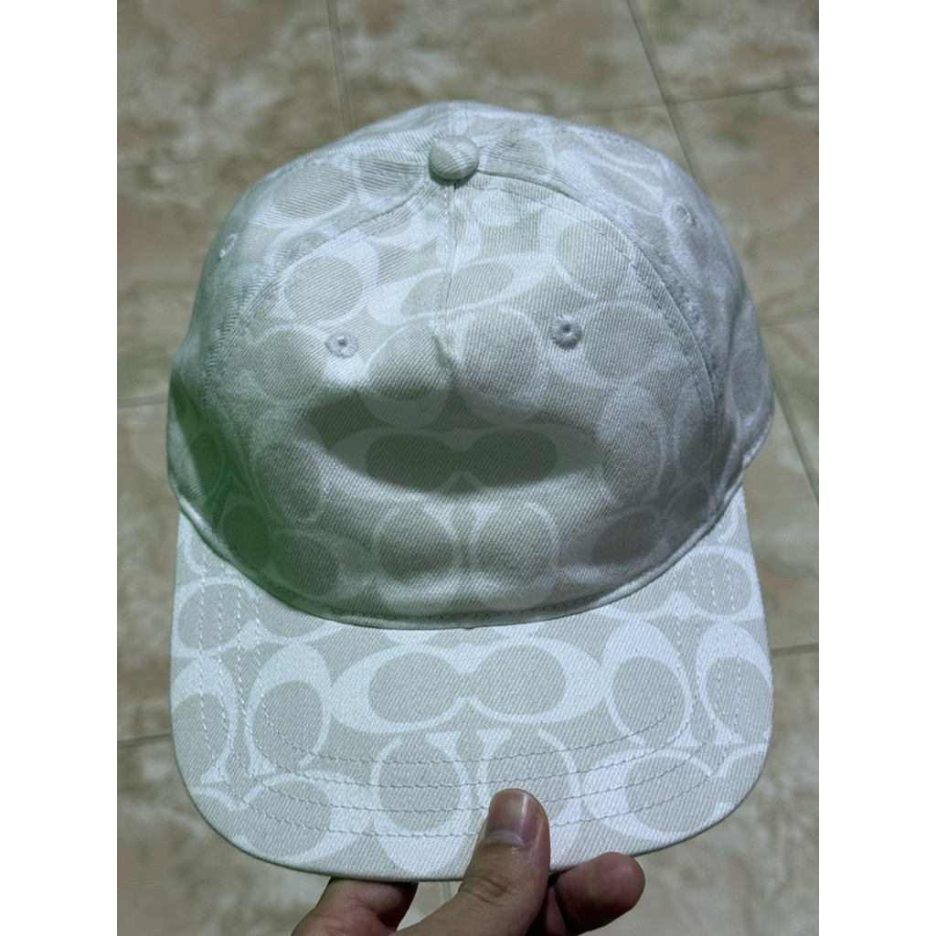 Topi Coach Asli beli di counter china