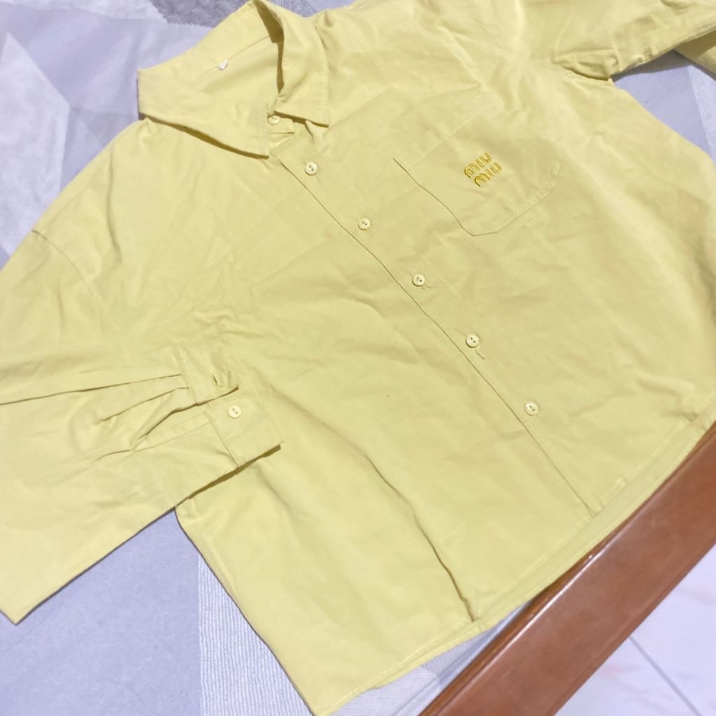 kemeja kuning Miu miu